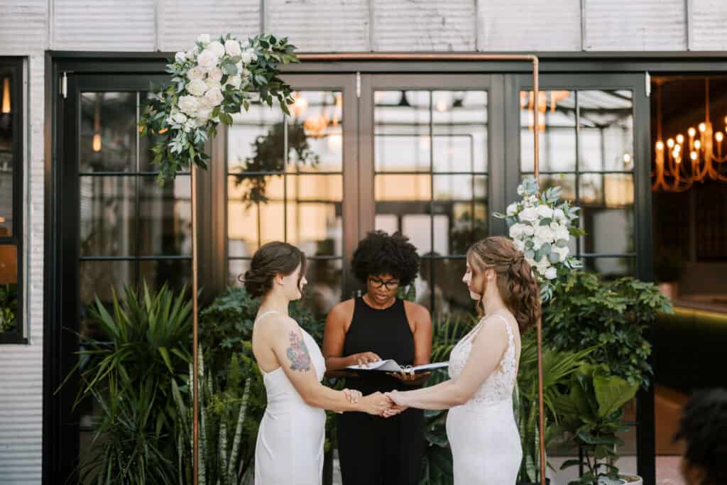 two brides share their vows during their intimate wedding ceremony in madison wisconsin