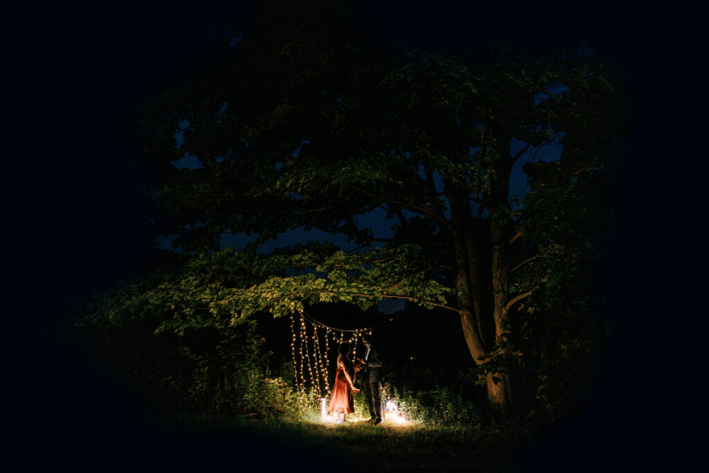 couple has intimate nighttime ceremony at devil's lake in wisconsin
